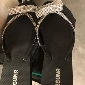 Black rubber flip flops